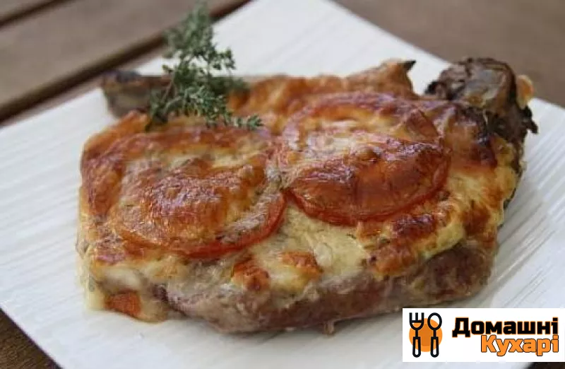 Рецепт М'ясо по-французьки з помідорами і сиром